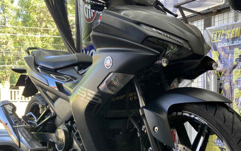 Manual motorcycle in the shop ready for inspection