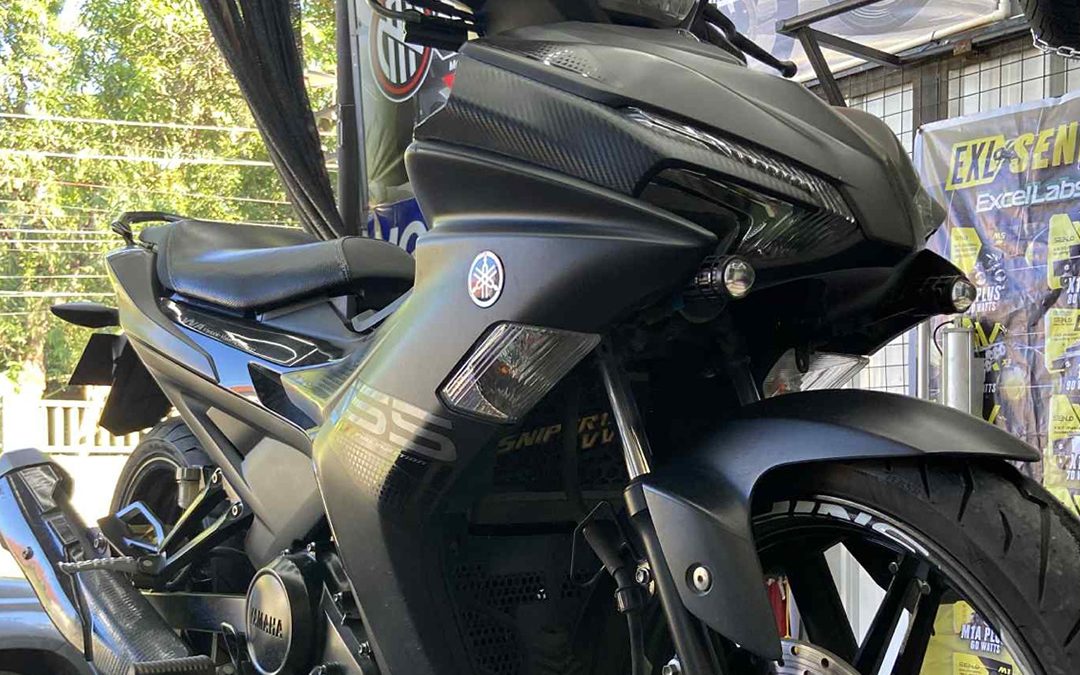Manual motorcycle in the shop ready for inspection